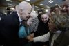 24219922-7959201-Biden_is_pictured_above_greeting_and_speaking_to_supporters_duri-a-2_15807447...jpg